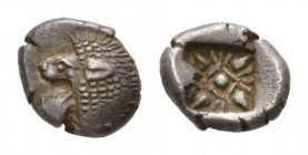 Ionia, Miletus Diobol Late VI-early V century, AR 10.5mm., 1.28g. Forepart of lion right, head left. Rev. Stellate pattern within incuse square. SNG K...