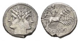 Quadrigatus circa uncertain mint circa 225-212, AR 20mm., 6.56g. Laureate Janiform head of Dioscuri; below neck truncation, dot. Rev. Jupiter in quadr...