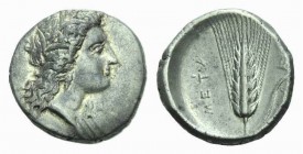 Lucania, Metapontum Nomos 330-290, AR 21.5mm., 7.74g. Head of Demeter r., wearing barley wreath. Rev. Ear of barley with leaf to r.; above, plough. SN...