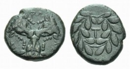 Phocis, Phokian League Bronze under Phalaikos, 351 BC and later., Æ 22mm., 8.15g. Three facing bull’s heads with sacrificial fillets, arranged in a tr...