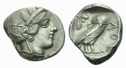 Attica, Athens Tetradrachm 430-420, AR 23.5mm., 16.91g. Head of Athena r., wearing crested helmet, earring and necklace; bowl ornamented with spiral a...