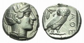 Attica, Athens Tetradrachm 420-415, AR 23.5mm., 17.14g. Head of Athena r., wearing crested helmet, earring and necklace; bowl ornamented with spiral a...