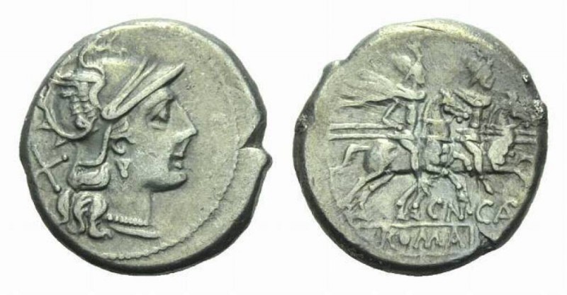 Cn. Calpurnius Denarius circa 189-180, AR 18.5mm., 4.56g. Helmeted head of Roma ...