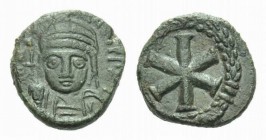 Justinian I, 527-565 Decanummo Sicily (?) 538-565, Æ 16.5mm., 4.05g. DN IVSTINI-ANVS PP AV, Helmeted and cuirassed bust facing, holding globe cruciger...