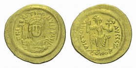 Justin II, 15 November 565 – 5 October 578 Solidus 565-578, AV 21mm., 4.48g. D N I – VSTI – NVS PP AVG Helmeted, pearl-diademed and cuirassed bust fac...