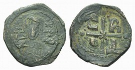 Romanus IV, 1068-1071 Follis Constantinople 1068-1071, Æ 28.5mm., 8.30g. Bust of Christ facing, holding Gospels; behind, pelleted cross . Rev. Cross w...