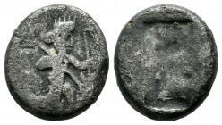 Achaemenid Empire. Time of Darios I to Xerxes II 485-420 BC. AR Siglos (15mm, 3.79g). Persian king or hero in kneeling-running stance right, holding s...