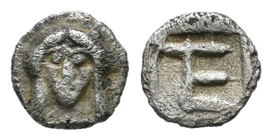 Ionia, Kolophon. ca.450-410 BC. AR Tetartemorion (5mm, 0.21g). Facing laureate h...