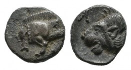 Mysia, Kyzikos, circa 450-400 BC. AR Hemiobol (6mm, 0.34g). Forepart of boar right; tunny to left / Head of roaring lion left, retrograde K to left; a...