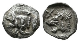 Mysia, Kyzikos, circa 5th century. AR hemiobol (8mm, 0.38g). Forepart of boar to left / Head of lion to left within incuse square, above floral star. ...