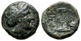 Mysia, Kyzikos. 3rd century BC. AE (17mm, 5.76g). Head of Kore Soteira right. / K-Y/Ξ-I, tripod, monogram to left and right.