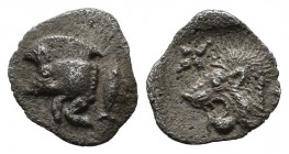 Mysia, Kyzikos. C450-400 BC. AR Hemiobol (9mm, 0.38g). Forepart of boar left; to right, tunny upward / Head of lion left; star to left; all within inc...