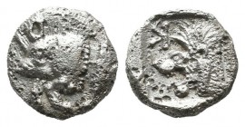 Mysia, Kyzikos. ca.450-400 BC. AR Obol (8mm, 0.72g). Forepart of boar left, to right, tunny upward. / Head of lion left, retrograde K to upper left, a...