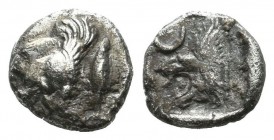 Mysia, Kyzikos. ca.450-400 BC. AR Tetartemorion (6mm, 0.23g). Forepart of winged boar left with short mane; to right, tunny upward. / Head of roaring ...