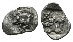 Mysia, Kyzikos. ca.480-400 BC. AR Trihemitartemorion (7mm, 0.32g). Forepart of boar right; tunny to left. / Head of roaring lion left; above floral st...