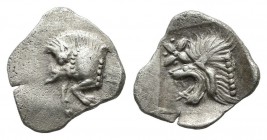 Mysia, Kyzikos. ca.480-400 BC. AR Trihemitartemorion (8mm, 0.38g). Forepart of boar right; tunny to left. / Head of roaring lion left; above floral st...