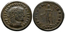Diocletianus, AD 284-305. Æ Follis (25mm-9,97 g). Heraclea mint, 3rd officina. Struck c.AD 297-298. Laureate head right / Genius standing left, holdin...