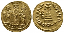 Heraclius, with Heraclius Constantine and Heraclonas, 610-641. AV Solidus (19mm, 4.54g), Constantinople, 639-641. Heraclonas, wearing cap with cross a...