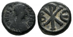 Justin I, AD 518-527. AE Pentanummium (12mm, 2.82g) . Constantinople. D N IVSTINVS P P AVG. Diademed, draped and cuirassed bust right / Large Chi-Rho;...