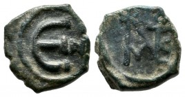 Justin II AD.565-578. AE Pentanummium (13mm, 1.90g). Nikomedia mint. IΥΣTINAI KAI ΣO ΦIAΣ; monogram (Sear type 8) of Justin II and Sophia. / Large Є; ...