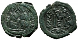 Justin II. AD 565-578. AE Follis (30mm, 13.50g). Constantinople mint. Justin and Sophia enthroned facing; Justing holding globus-cruciger, Sophia hold...