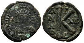 Justinian I, AD 527-565. AE Half Follis (28mm, 11.42g). Constantinople. Dated RY 13 (539/40). D N IVSTINIANVS P P AVG. Helmeted and cuirassed bust fac...