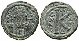 Justinian I. AD 527-565. AE Half Follis (31mm, 12.57g). Constantinople mint, 4th officina. Dated RY 14 (540/1). Diademed, helmeted, and cuirassed faci...