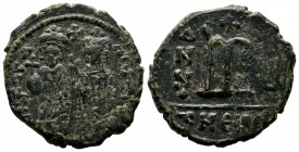 Phocas, AD 602-610. AE Follis (27mm, 9.55g). Antioch. D N FOCA NE PE AV. Phocas and Leontia standing facing with globus cruciger and cruciform sceptre...