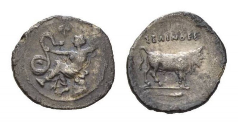 Sicily, Selinous Litra Circa 410 BC., AR 12mm., 0.72g. Nymph seated left on rock...