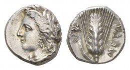 Lucania, Metapontum Nomos Circa 330-290, AR 19mm., 7.91g. Wreathed head of Demeter l. Rev. Barley ear with leaf to left; above leaf, griffin springing...