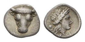 Phocis, Federal coinage Obol Circa 478-460, AR 9mm., 0.95g. Bull's head facing. Rev. Forepart of boar right within incuse square. SNG Copenhagen 90.
...