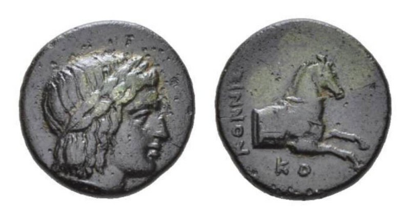 Ionia, Kolophon Bronze Circa 360-330, Æ 13mm., 2.08g. Konnis, magistrate. Laurea...