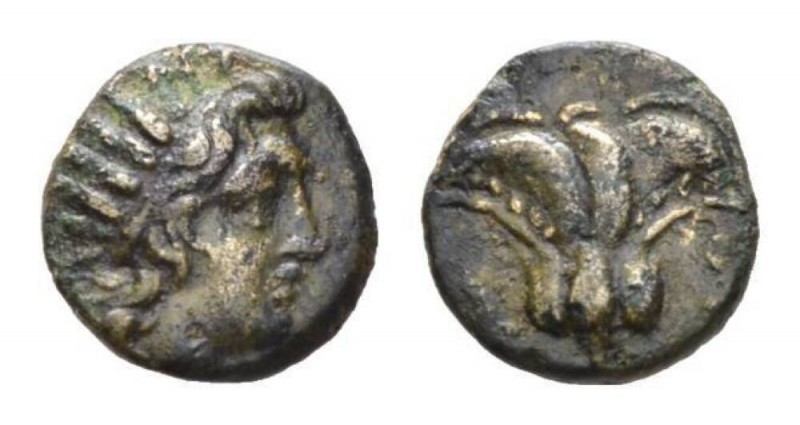 Caria, Rhodes Bronze II cent. BC, Æ 12mm., 1.40g. Radiate head Helios r. Rev. Ro...