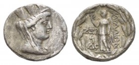 Phoenicia, Aradus Tetradrachm Circa 93-92, AR 27.5mm., 14.86g. Draped bust of Tyche with turreted crown r. Rev. APAΔIΩN Nike standing to l. within wre...