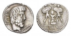 L. Tituri L.f. Sabinus. Denarius circa 89, AR 18mm., 4.08g. SABIN Head of King Tatius r.; below chin, palm. Rev. Tarpeia stands facing between two sol...