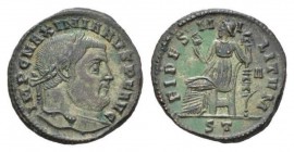 Maximianus Herculeus second reign, 305 – 308 Follis Ticinum circa 306, Æ 27mm., 9.25g. IMP C MAXIMIANVS P F AVG Laureate head r. Rev. FIDES MILITVM Fi...