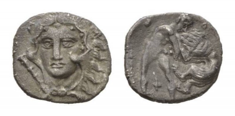 Calabria, Tarentum Diobol 325-280, AR 11.5mm., 1.09g. Head of Heracles, wearing ...