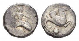Calabria, Tarentum Nomos 500-490, AR 19mm., 8.09g. Dolphin rider r., holding octopus. Rev. Hippocampus r.; below, shell. Fischer-Bossert 58. Vlasto 99...