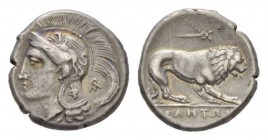 Lucania, Velia Nomos circa 280, AR 20.5mm., 7.46g. Helmeted head of Athena l., helmet decorated with griffin; behind neck guard,Φ. Behind, AP monogram...