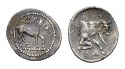 Sicily, Gela Litra 465-450, AR 12.5mm., 0.82g. Horse standing r., with bridle loose; in field above, wreath. Rev. CELAΣ Forepart of man-headed bull r....