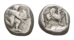 Caria, Kaunos Hemidrachm 490-470, AR 11mm., 2.70g. Winged female figure in kneeling-running stance right, head l. Rev. Griffin standing r., raising fo...