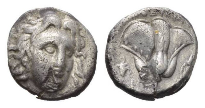 Caria, Ainetor, magistrateRhodes Drachm 205-188, AR 18.5mm., 6.55g. Head of Heli...