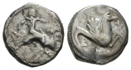 Calabria, Tarentum Nomos 500-490, AR 18mm., 8.01g. Tarentum. Circa 500-490 BC. AR Nomos (8.05 g, 12h). Taras riding dolphin right, holding cuttlefish,...