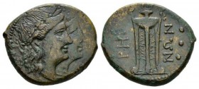 Bruttium, Rhegium Triens 215-210, Æ 26.5mm., 12.68g. Jugate heads of Apollo and Artemis r. Rev. PHΓI-NΩN Tripod; in r. field four pellets. SNG ANS 743...