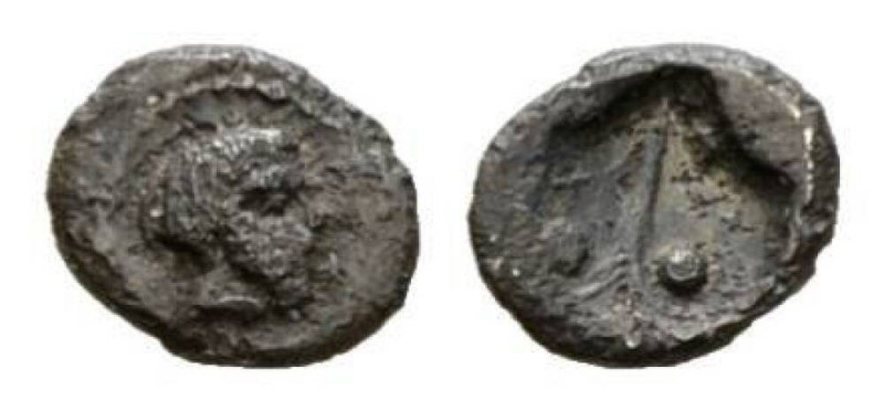 Sicily, Naxos Hexas 430, AR 6mm., 0.15g. Head of Dionysos r. Rev. Vine leaf (?);...