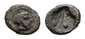 Sicily, Naxos Hexas 430, AR 6mm., 0.15g. Head of Dionysos r. Rev. Vine leaf (?); on each side, pellet. Cahn -. Campana 14.

Extremely rare. Only two...