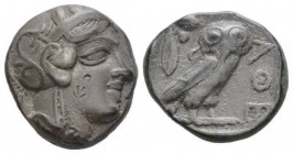 Attica, Athens Tetradrachm circa 429, AR 22.5mm., 17.00g. Helmeted head of Athena r. Rev. Owl, standing r., in upper l. field, olive sprig and crescen...
