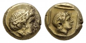 Lesbos, Mytilene Hecte circa 412-378, EL 10.5mm., 2.55g. Head of Io r., wearing tainia. Rev. Wreathed head of Dionysos right within linear square with...