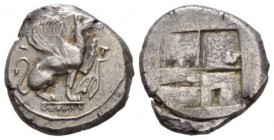 Ionia, Teos Stater circa 478-465, AR 23mm., 12.08g. Griffin seated r., with l. foreleg raised; in r. field, two olive leaves. Rev. Quadripartite incus...