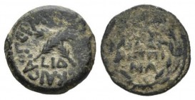 Judaea, Antonius Felix, 52-59Jerusalem Prutah 54-55 (year 14 of Claudius), Æ 17mm., 2.95g. Crossed palms; below, L IΔ. Rev. IOV/ΛI AΓ/PIΠΠ/INA in four...